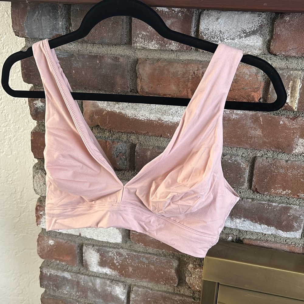 Pink Victoria’s Secret sports bra